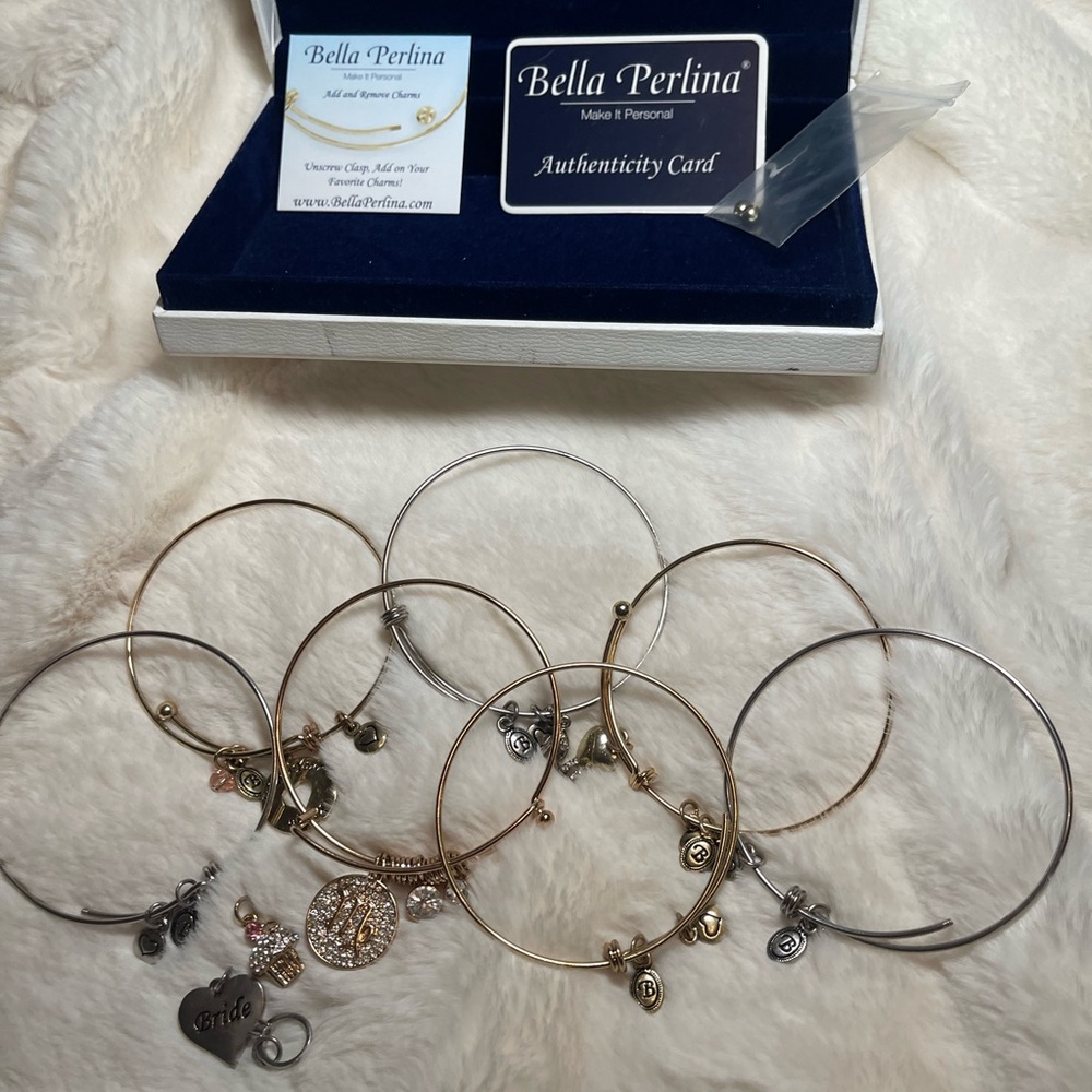 Multiple silver Bella Perlina bracelets.